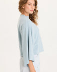 ASYMMETRICAL SLEEVE TOP