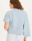 ASYMMETRICAL SLEEVE TOP