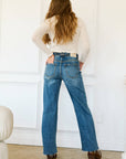 DUAL ACCENT CROSSOVER CUFF STRAIGHT LEG JEANS