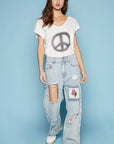 Dropped short sleeve studded peace emblem tee