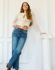 DUAL ACCENT CROSSOVER CUFF STRAIGHT LEG JEANS