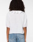 WHITE BLOUSE W/RUFFLE DETAIL