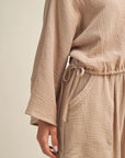 V-neck taupe blouse in gauze fabric with a dolman slv top