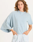 ASYMMETRICAL SLEEVE TOP