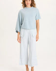 ASYMMETRICAL SLEEVE TOP