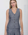 Sleeveless button-down vest featuring a v-neckline