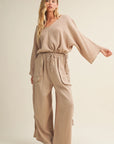 V-neck taupe blouse in gauze fabric with a dolman slv top