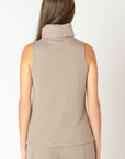 ALMOND SLVLESS TURTLENECK